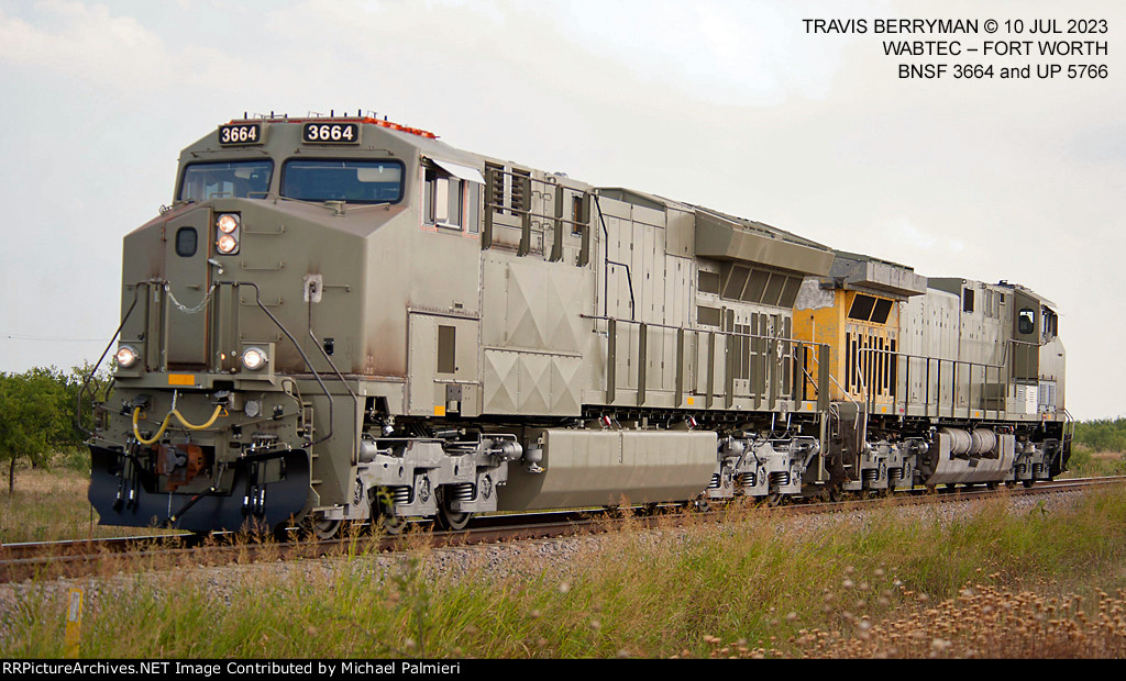 BNSF 3664 and UP 5766